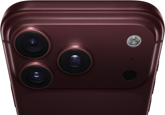 iPhone 18 Pro, burgundy color, rounded edges and corners, partial back exterior angled to show Pro Fusion camera system in top left corner, three lenses, microphone, flash