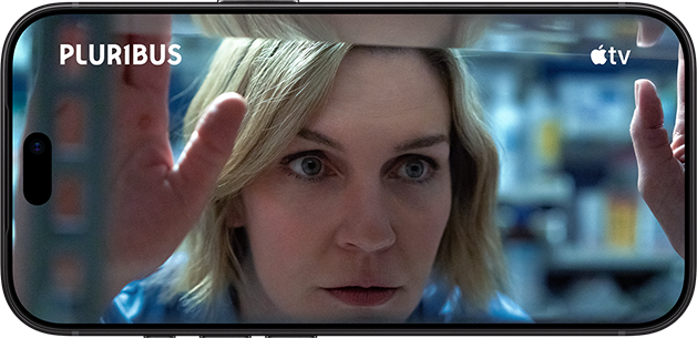 iPhone 18 Pro, landscape mode, displaying scene from series titled: Pluribus, Apple TV logo