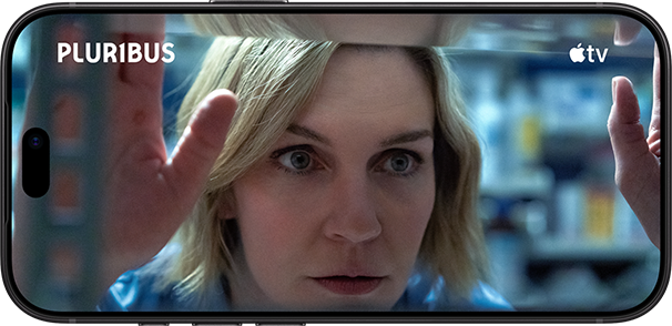iPhone 18 Pro, landscape mode, displaying scene from series titled: Pluribus, Apple TV logo