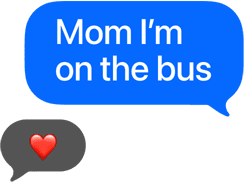 Texting feature on Apple Watch, one blue color bubble reads: Mom I'm on the bus and the other is a red color heart emoji