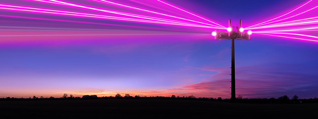 5G laser beams at dusk